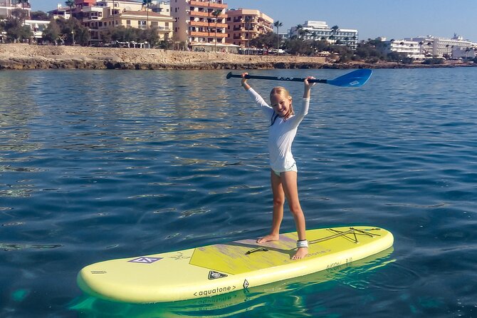 90' Stand Up Paddle tour in a small group in Cala Ratjada - Getting on the board: beginner coaching that actually helps