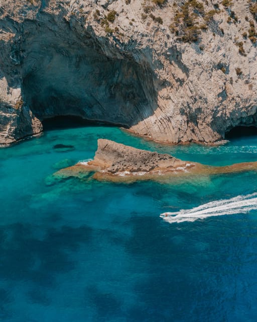 Alcudia: JetSki Tour Coll Baix beach & Caves (free Photos) - Where You Start at Club Nautico Alcudiamar, Pier 4