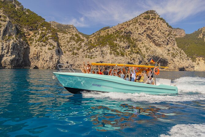 Boat Trip to Llevant Natural Park and Blue Cave - ES Caló: disembark, bathe, and use the paddle surfboards