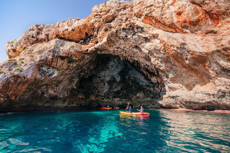 Cala Varques: Guided Sea Caves Kayak & Snorkeling Expedition - The kayaking portion: caves, arches, and cliff views you earn