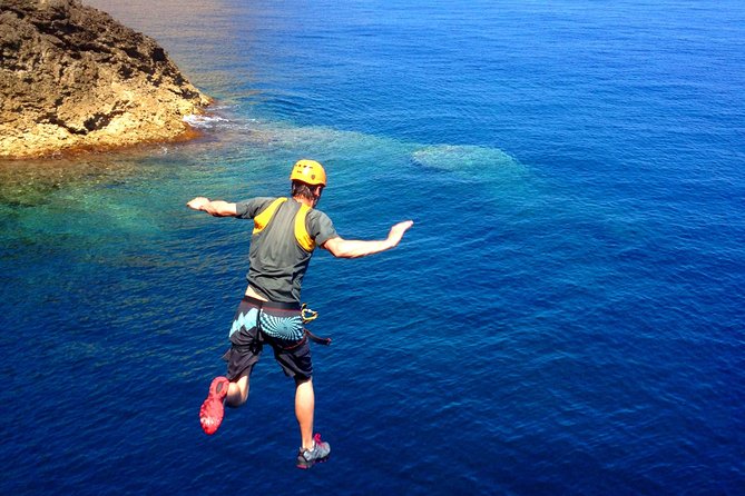 Coasteering Cliff jumping - Stop 1 in Alcudia: getting set up for rock, water, and choices