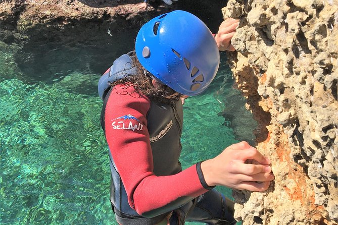 Coasteering Cliff jumping - Stop 2 at Port d’Alcudia: cliff jumping, snorkeling, abseiling, and sea caves