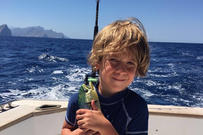 Fishing Trips in Mallorca with Captain Martin - Rodman 14 Metros Gear and Comfort: Downriggers, Toilet, and Included Tackle