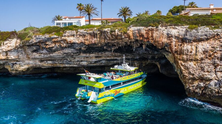 From Cala Millor: East Coast Glass-Bottom Boat Trip - Sea Odyssey, 4 hours (Porto Cristo up to Cala Ratjada): longer loop, plus a swim stop