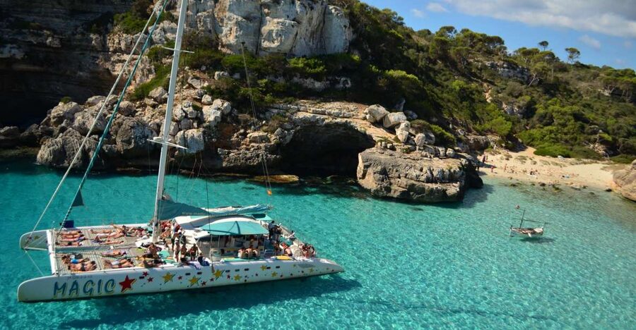 From Colònia de San Jordi : Catamaran Cruise to Es Trenc - The Sail Out: Mediterranean Views and a Fun, Low-Stress Rhythm