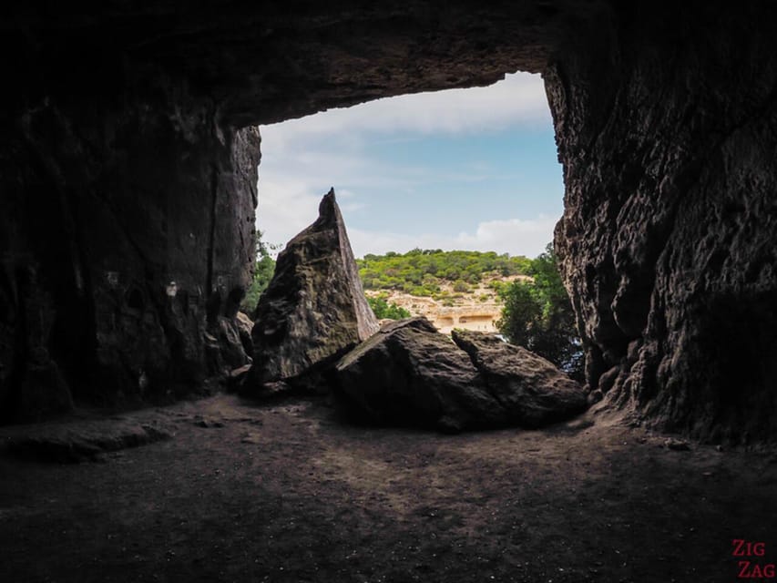 From Palma: Portal Vells Beach and Cave SUP & Snorkel Tour - Cova de Portals Vells: the cave area and an optional jump