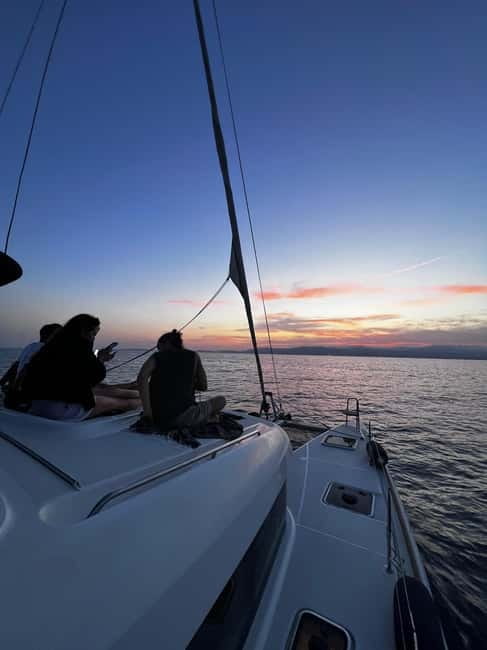Majorca: Dinner aboard a private catamaran with snorkeling and paddle surfing - Snorkeling and stand up paddleboarding in two different moments