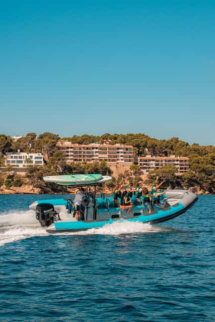 Mallorca: 2h speedboat tour, visit caves, cliffs and snorkel - Cruising past the cathedral and Mallorca’s coastline views