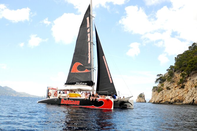 Mallorca Catamaran Tour in the Bay of Pollensa - Formentor Beach and the Watchtower Above: The Main Scenic Payoff