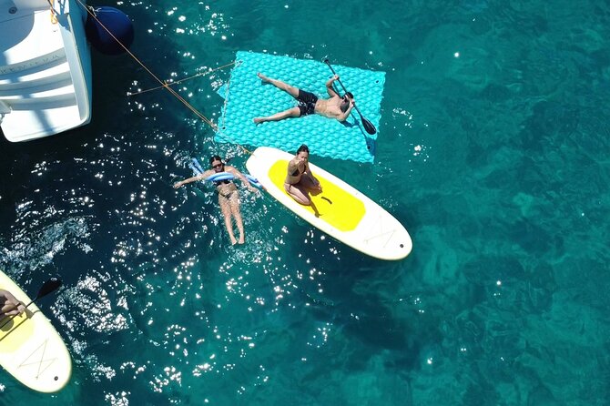 Mallorca Catamaran Tour with Tapas - small group - - The Crew Dynamic: Captain Daniel and Natalia Keeping It Easy