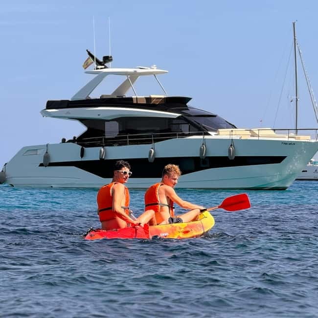 Mallorca: Kayak and Paddleboard Excursion Through Crystal Clear Caves - Entering Mallorca’s cave coastline from Playa Barca