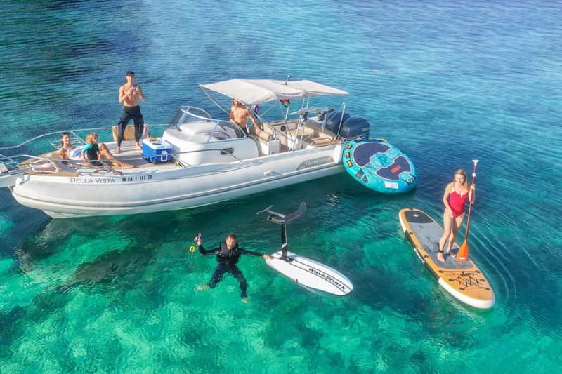 Mallorca: Private Watersports Boat. LUNCH Drinks SUP, Tubing - Enter Puerto Portals, Then Head Straight for the Good Stuff