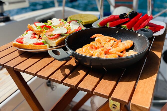 Mallorca sailing tour with tapas and wine - Stop 3: Platja des Coll Baix for snorkeling and SUP time