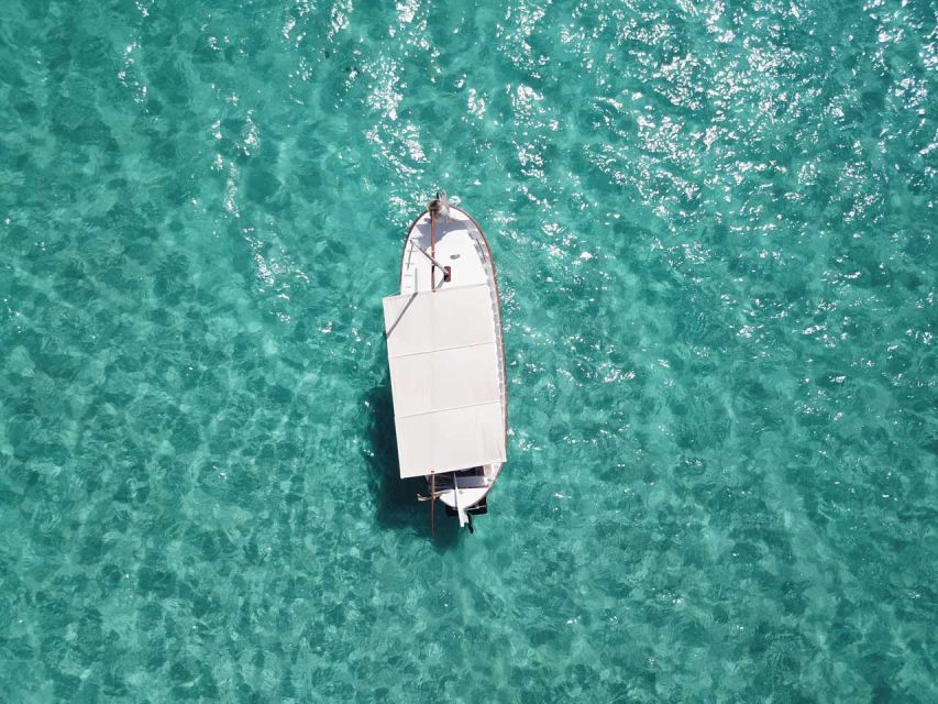 Mallorca: Southern Beaches Private Llaut Boat Tour - Getting to Club Nàutic Sa Ràpita and Dock H