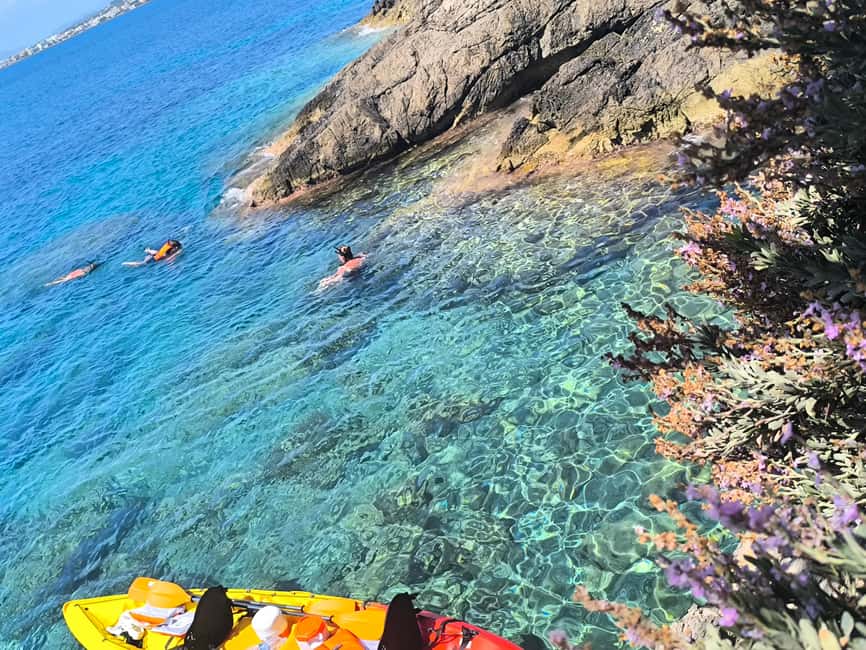 Mallorca: Sunset Kayak Tour with Snorkeling & Picnic - The picnic stop: local products on a beach or in a cove