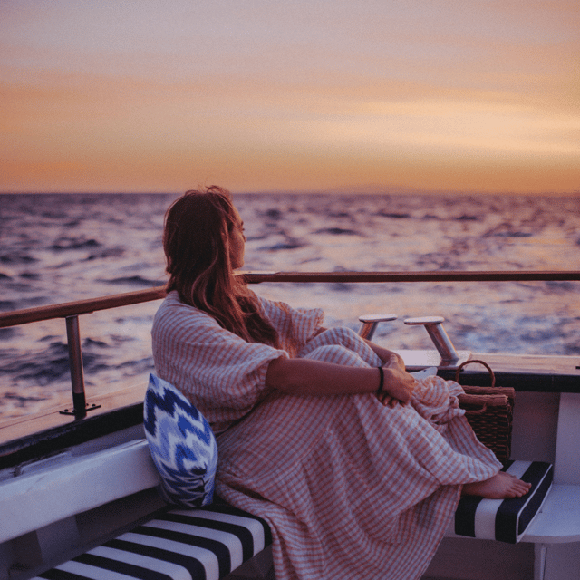 Palma Bay: Boat Tour with BBQ, Snorkelling, & Sunset Option - The music and crew energy, with Roger and Juan Diego in the mix