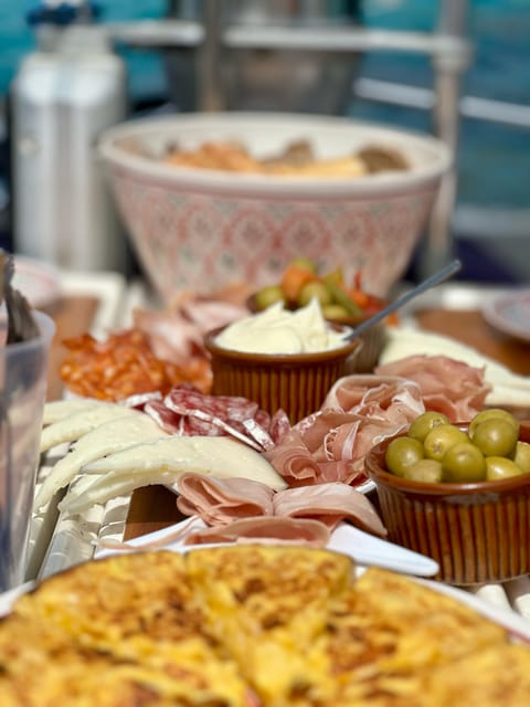 Palma de Mallorca: Sailing Boat Trip with Skipper & Tapas - The Bay of Palma sailing time, aperitif, and scenic cruising