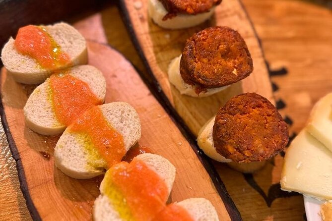 Palma Evening Tapas Walking Tour with Pinchos & Drinks - Plaza del Rey Juan Carlos I: the bridge between old Palma and the newer city