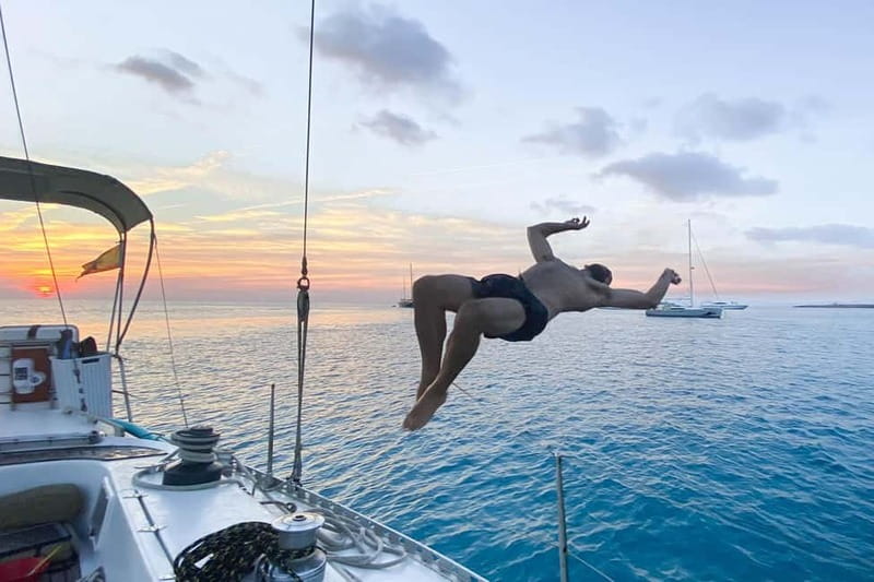 Palma: Private Half-Day Sailing Trip with Tapas & Drinks - Cala Comtesa: swim time with snorkeling gear and SUP