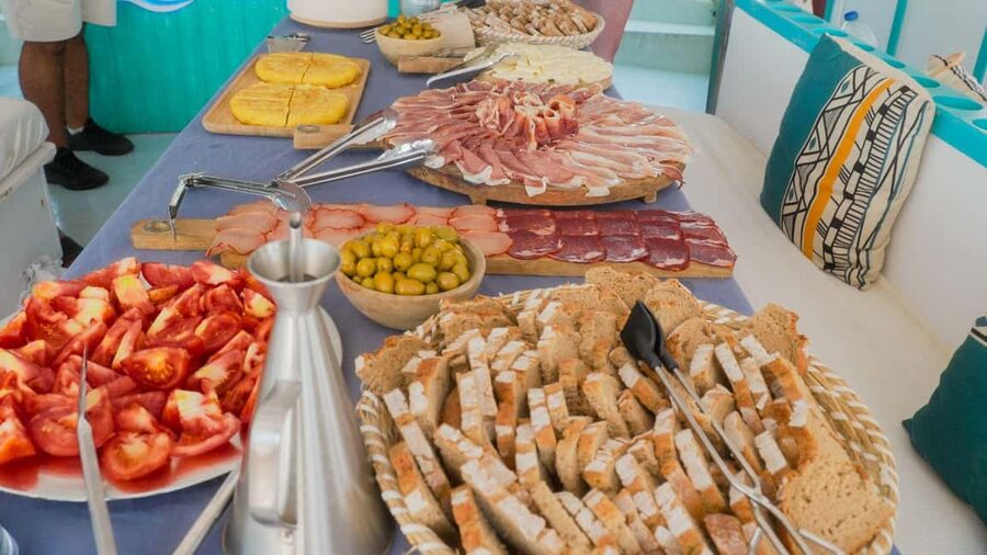 Palma: Punta Negra and Ses Illetes Boat Trip with Live Music - Swimming Stop Details: Snorkel, Paddle Surf, and Cove Time