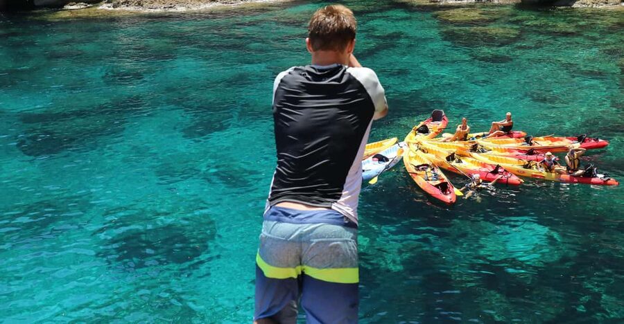 Pollença: Kayak and Coasteering Cliff Jumping - Kayaking the north-coast route: blue water, small islands, and a 1.5 km push