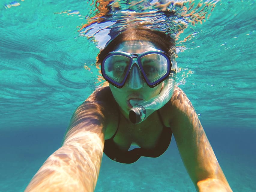 Port de Sóller: Snorkeling Tour with Professional Guide - Port de Sóller’s snorkeling, framed by the Tramuntana coast