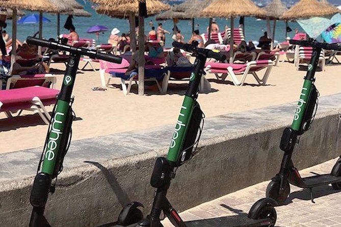 Premium electric Scooter rental with optional delivery - Riding With Helmet, Reflective Belt, and a Padlock for Multi Day Plans