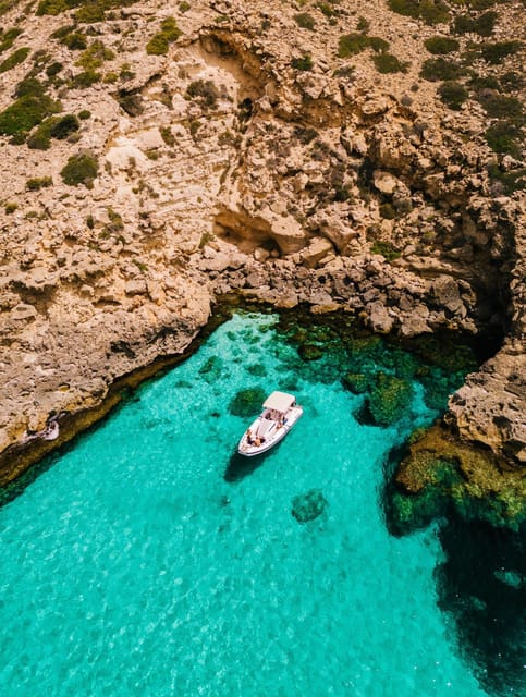 Private Boat Trip & Snorkel to Marine Reserve Mallorca - Sunset drinks on board with Palma Bay photo angles