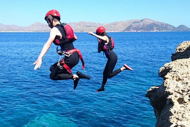 Small-Group Cliff Jumping Experience in Mallorca - Serra de Tramuntana Base Camp: gear up, then trust your instructor
