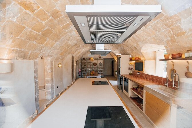 Spanish Cooking Experience in Mallorca - After cooking: the shared dining table and the open bar